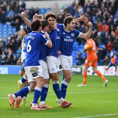 061225 - Cardiff City v Huddersfield Town - Sky Bet League 1 - Yousef Salech of Cardiff City celebrates scoring a goal with team mates