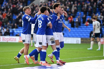 061225 - Cardiff City v Huddersfield Town - Sky Bet League 1 - Yousef Salech of Cardiff City celebrates scoring a goal with team mates