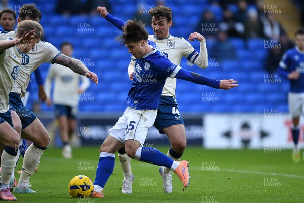 061225 - Cardiff City v Huddersfield Town - Sky Bet League 1 - Cian Ashford of Cardiff City is challenged by Ryan Ledson of Huddersfield