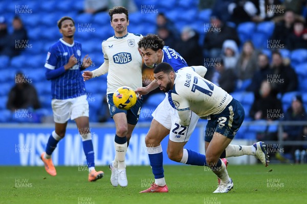 061225 - Cardiff City v Huddersfield Town - Sky Bet League 1 - Yousef Salech of Cardiff City is challenged by Radinio Balker of Huddersfield