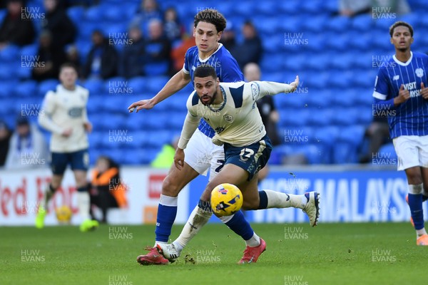 061225 - Cardiff City v Huddersfield Town - Sky Bet League 1 - Yousef Salech of Cardiff City is challenged by Radinio Balker of Huddersfield