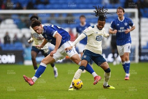 061225 - Cardiff City v Huddersfield Town - Sky Bet League 1 - Yousef Salech of Cardiff City is challenged by David Kasumu of Huddersfield