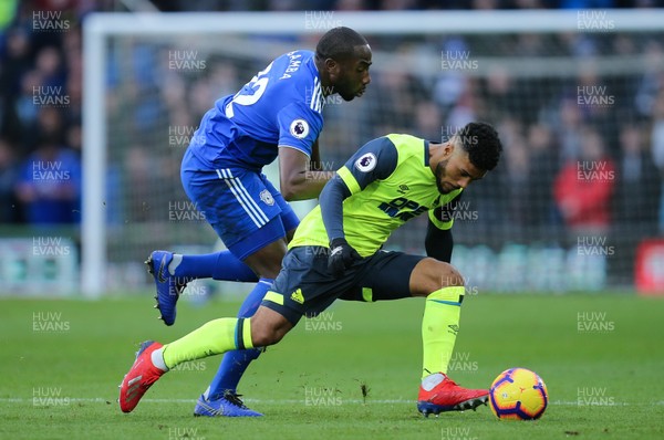 120119 -  Cardiff City v Huddersfield Town, Premier League - Elias Kachunga of Huddersfield is challenged by Sol Bamba of Cardiff City