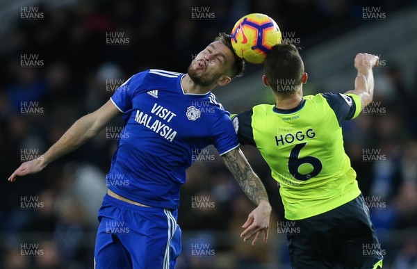 120119 -  Cardiff City v Huddersfield Town, Premier League - Joe Ralls of Cardiff City and Jonathan Hogg of Huddersfield compete for the ball