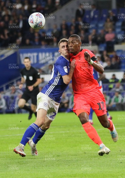 210819 - Cardiff City v Huddersfield Town, Sky Bet Championship -Gavin Whyte of Cardiff City and Rajiv van La Parra of Huddersfield Town compete for the ball