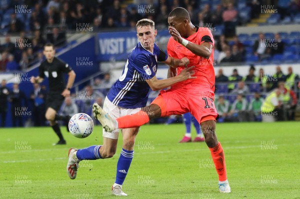 210819 - Cardiff City v Huddersfield Town, Sky Bet Championship -Gavin Whyte of Cardiff City and Rajiv van La Parra of Huddersfield Town compete for the ball