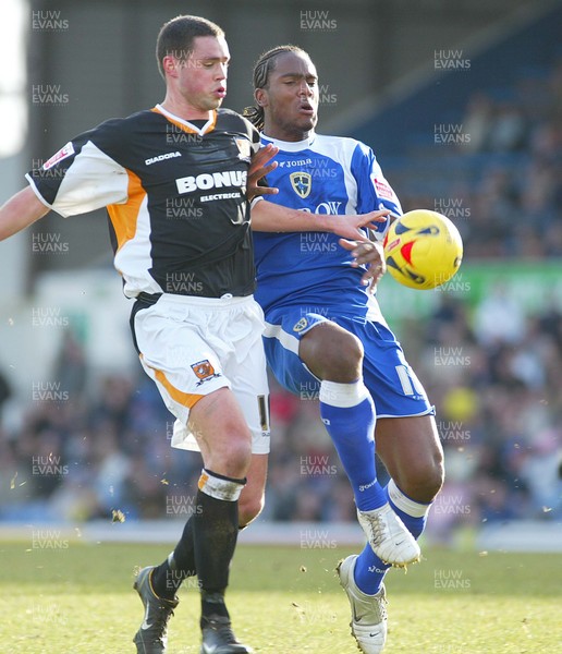 180206 Cardiff City v Hull City Cardiff's Cameron Jerome gets in front of Damien Delaney to chip the ball and score goal 