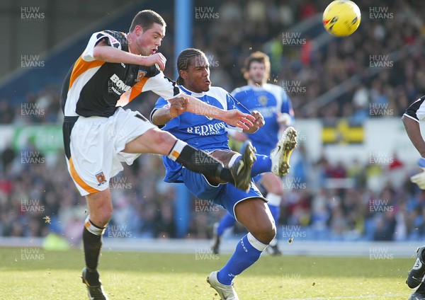 180206 Cardiff City v Hull City Cardiff's Cameron Jerome gets in front of Damien Delaney to chip the ball and score goal 