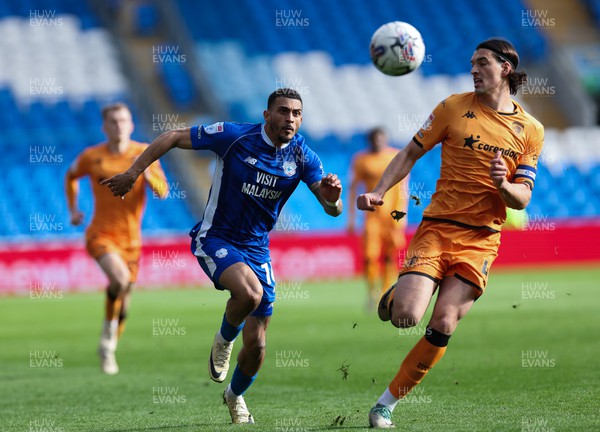 060424 - Cardiff City v Hull City, EFL Sky Bet Championship -  Karlan Grant of Cardiff City and Jacob Greaves of Hull City compete for the ball