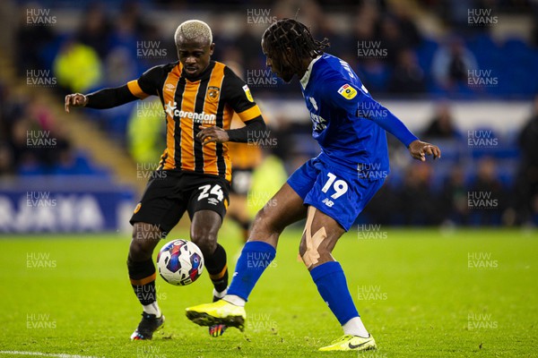 081122 - Cardiff City v Hull City - Sky Bet Championship - Romaine Sawyers of Cardiff City in action against Jean Michael Seri of Hull City