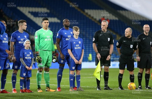 161217 - Cardiff City v Hull City - SkyBet Championship - Mascot Meirion Timothy walks onto the field at Souleymane Bamba of Cardiff City and the Cardiff team