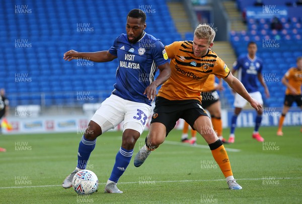 220720 - Cardiff City v Hull City - SkyBet Championship - Junior Hoilett of Cardiff City is challenged by Daniel Batty of Hull City