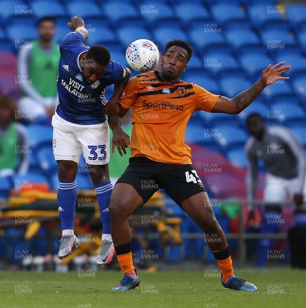 220720 - Cardiff City v Hull City - SkyBet Championship - Junior Hoilett of Cardiff City is challenged by Mallik Wilks of Hull City