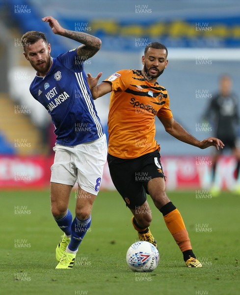 220720 - Cardiff City v Hull City - SkyBet Championship - Joe Ralls of Cardiff City is challenged by Kevin Stewart of Hull City