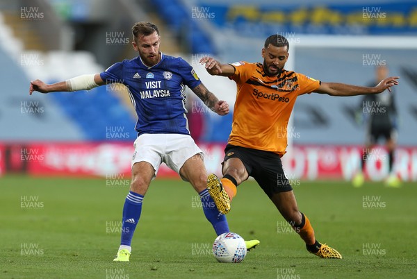 220720 - Cardiff City v Hull City - SkyBet Championship - Joe Ralls of Cardiff City is challenged by Kevin Stewart of Hull City