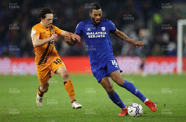 241121 - Cardiff City v Hull City - SkyBet Championship - Curtis Nelson of Cardiff City is challenged by George Honeyman of Hull City