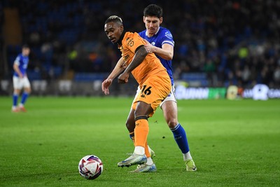 250225 - Cardiff City v Hull City - Sky Bet Championship - Callum O'dowda of Cardiff City is challenged by Lincoln BRA of Hull City