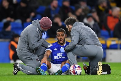 250225 - Cardiff City v Hull City - Sky Bet Championship - Andy Rinomhota of Cardiff City receives treatment