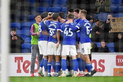 250225 - Cardiff City v Hull City - Sky Bet Championship - Callum Robinson of Cardiff City celebrates scoring a goal with team mates