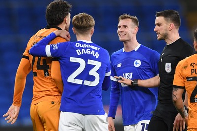 250225 - Cardiff City v Hull City - Sky Bet Championship - Things heat up between Sivert Mannsverk of Cardiff City and Matt Crooks of Hull City and both receive a yellow card