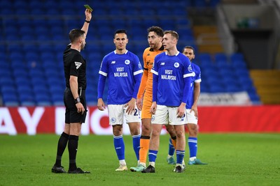 250225 - Cardiff City v Hull City - Sky Bet Championship - Things heat up between Sivert Mannsverk of Cardiff City and Matt Crooks of Hull City and both receive a yellow card