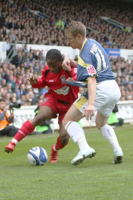 25.04.09  Cardiff City vs. Ipswich Town. The Coca Cola Championship -  Jamie Peters holds off Paul Parry. 