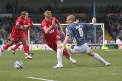 25.04.09  Cardiff City vs. Ipswich Town. The Coca Cola Championship -  Jon Steadtries pushes the ball past Gabor Gypes.  