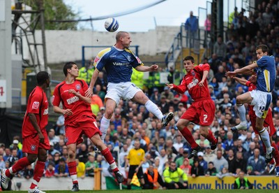 25.04.09 - Championship Football Cardiff City v Ipswich Town Cardiff's Gabor Gyepes gets to a high ball as Ipswich's David Norris and Ipswich's Owen Garvan challenge 