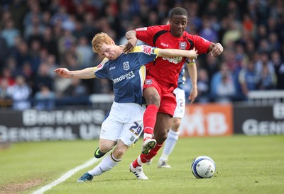 25.04.09 - Cardiff City v Ipswich Town, Coca Cola Championship -  Cardiff's Chris Burke tangles with Ipswich's Kevin Lisbie  