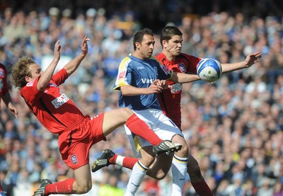 25.04.09 - Championship Football Cardiff City v Ipswich Town Cardiff's Michael Chopra is challenged by Ipswich's Matt Richards and Pim Balkestein 