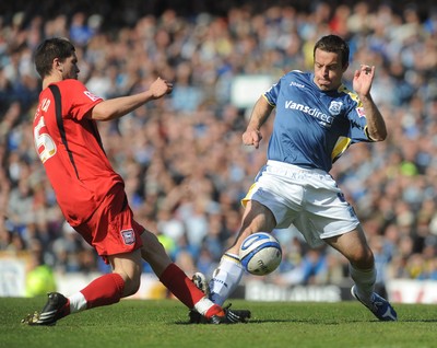 25.04.09 - Championship Football Cardiff City v Ipswich Town Cardiff's Gavin Rae is tackled by Ipswich's Pim Balkestein 