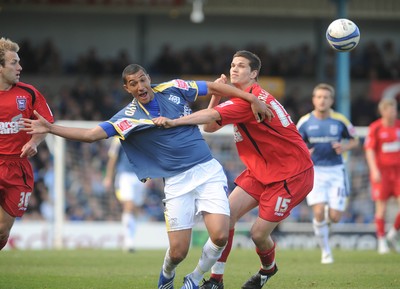 25.04.09 - Championship Football Cardiff City v Ipswich Town Cardiff's Jay Bothroyd and Ipswich's Pim Balkestein compete 
