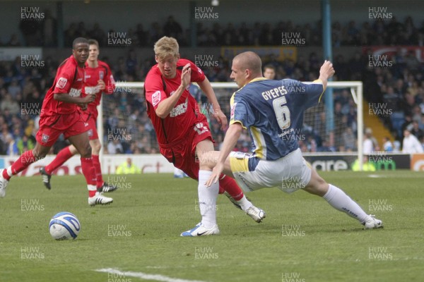 25.04.09  Cardiff City vs. Ipswich Town. The Coca Cola Championship -  Jon Steadtries pushes the ball past Gabor Gypes.  