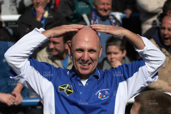 25.04.09  Cardiff City vs. Ipswich Town. The Coca Cola Championship -  Lifetime Bluebirds supporter Alyn Lewis makes a 13,000km trip from his adopted home in Sydney, Australia to see Cardiff City play their last league game at Ninan Park.  