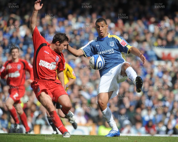 25.04.09 - Championship Football Cardiff City v Ipswich Town Cardiff's Jay Bothroyd is challenged by Ipswich's David Norris 