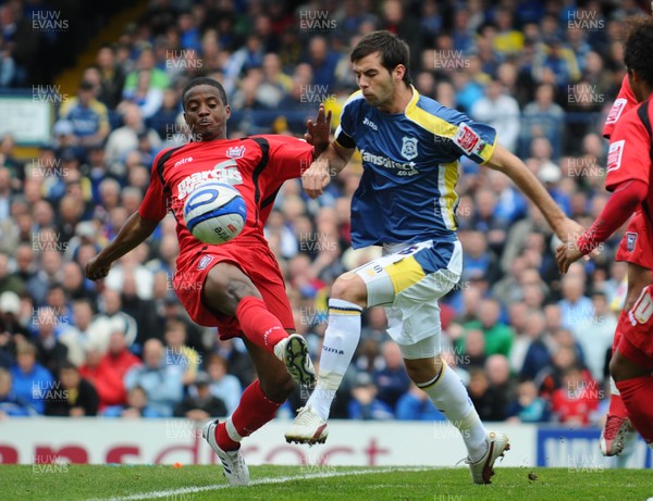 25.04.09 - Championship Football Cardiff City v Ipswich Town Cardiff's Joe Ledley is challenged by Ipswich's Kevin Lisbie 