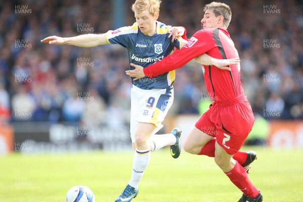 25.04.09 - Cardiff City v Ipswich Town, Coca Cola Championship -  Cardiff's Chris Burke holds off Ipswich's Owen Garvan  