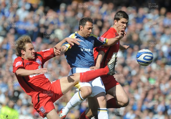 25.04.09 - Championship Football Cardiff City v Ipswich Town Cardiff's Michael Chopra is challenged by Ipswich's Matt Richards and Pim Balkestein 