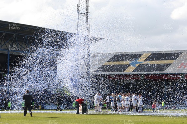 25.04.09 - Cardiff City v Ipswich Town, Coca Cola Championship -  Cardiff City players and their families are showered in paper tape as they gather on the pitch at the end of the final league match at Ninian Park 