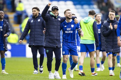 090324 - Cardiff City v Ipswich Town - Sky Bet Championship - Callum Robinson & Joe Ralls of Cardiff City at full time