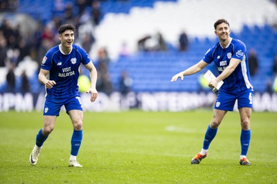 090324 - Cardiff City v Ipswich Town - Sky Bet Championship - Callum O'Dowda & Ryan Wintle of Cardiff City at full time