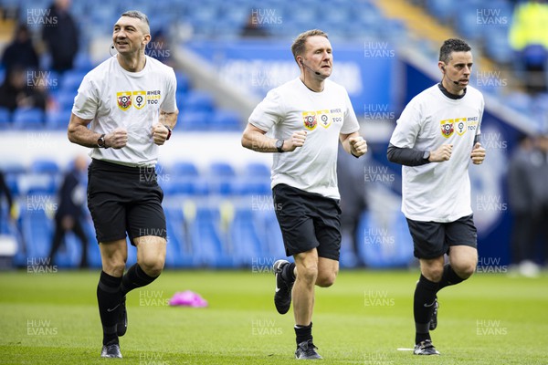 090324 - Cardiff City v Ipswich Town - Sky Bet Championship - Match Referee Oliver Langford and his Assistants Greg Read & History Karaivanov during the warm up