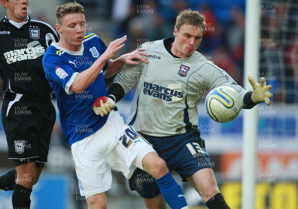 15.10.11 -  Cardiff City v Ipswich Town, npower Championship -  Ipswich's keeper David Stockdale beats Cardiff's Joe Mason to the ball 