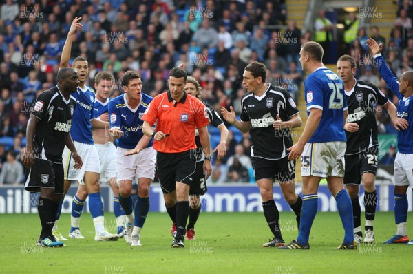 15.10.11 -  Cardiff City v Ipswich Town, npower Championship -  Players surround referee Dean Whitestone as Cardiff appeal for a penalty  