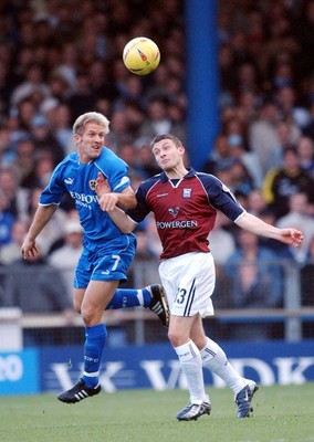 291103 - Cardiff City v Ipswich Town - Cardiff's John Robinson beats Ian Westlake (rt)