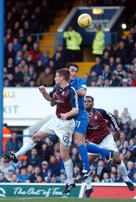 291103 - Cardiff City v Ipswich Town - Cardiff's Peter Thorne gets close as he battles with Richard Naylor