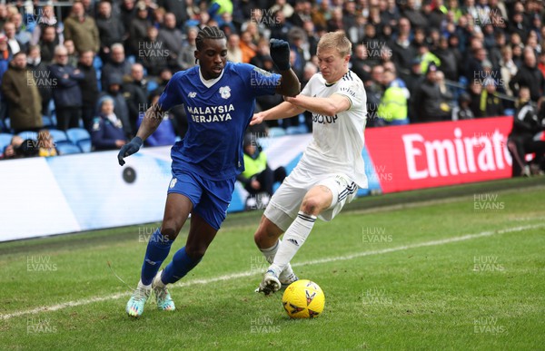 080123 - Cardiff City v Leeds United, Emirates FA Cup Third Round - Sheyi Ojo of Cardiff City gets the better of Rasmus Kristensen of Leeds United