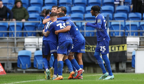 080123 - Cardiff City v Leeds United, Emirates FA Cup Third Round - Cardiff City players celebrate with Sheyi Ojo of Cardiff City after scoring the second goal