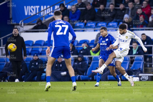 130124 - Cardiff City v Leeds United - Sky Bet Championship - Georginio Rutter of Leeds United in action against Andy Rinomhota of Cardiff City
