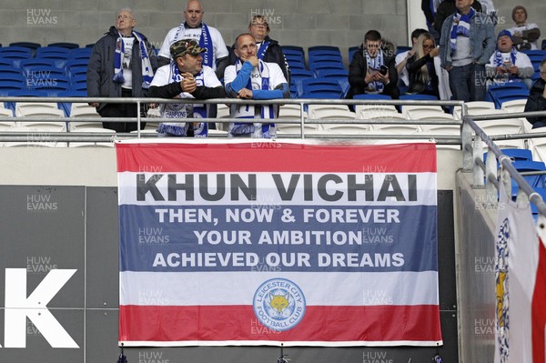 031118 - Cardiff City v Leicester City, Premier League - Leicester City fans display a flag in memory of Leicester City owner Vichai Srivaddhanaprabha who died when his helicopter crashed after taking off from the King Power Stadium last weekend